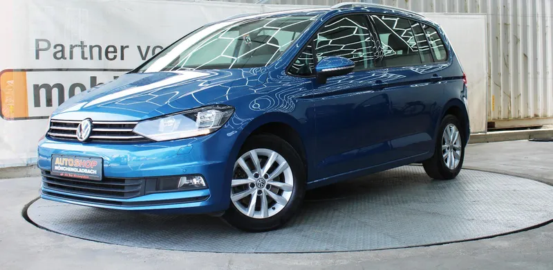 Семейный прагматизм в синем цвете: разбор Volkswagen Touran 1.4 TSI